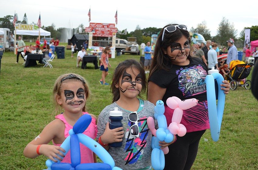 Ciara-Marie Dallas, Izabella and Adryana Perez all had their faces painted like KISS.