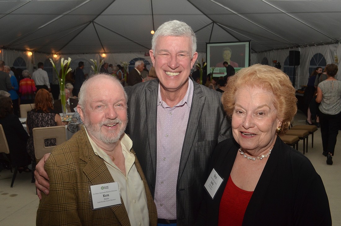 Michael Donald Edwards (center) with Ken Shalin and Judy Weinstein was honored by Equality Florida with its 2015 Voice For Equality award.