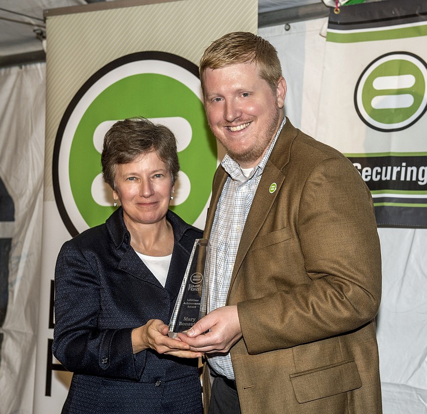 Mary Bonauto receiving the 2015 Lifetime Achievement Award from Co-Chair Jarred Wilson