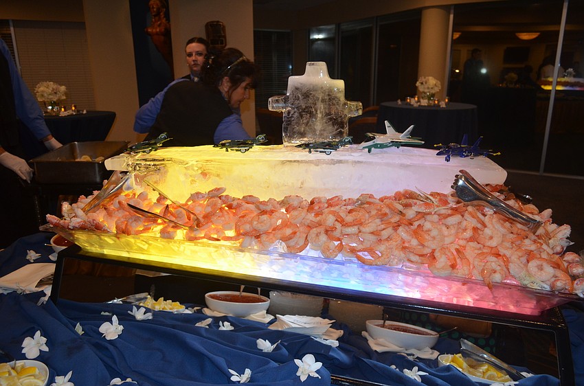 The event featured an ice sculpture in the shape of an aircraft carrier.