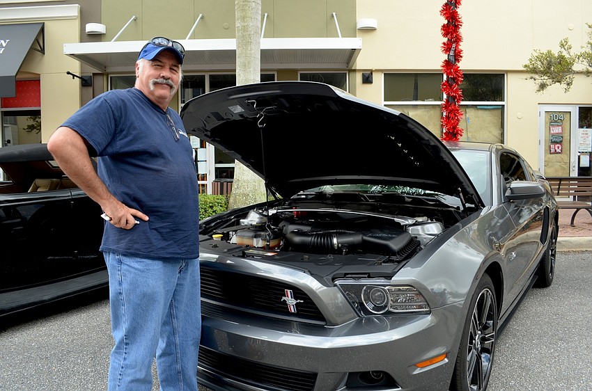 Mike Otis, of Bradenton, shows off his 2013 Mustang GT California Special.
