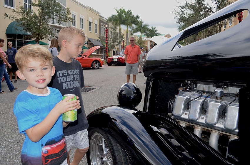 Gregory and Adam King, of Bradenton, check out a '33 Roadster.