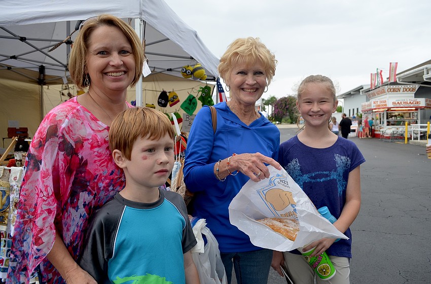 Jacob and Christina Hanlon, Delores Thiers and Caitlyn Hanlon, of Bradenton, enjoy family time.