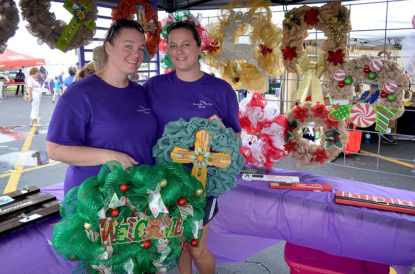 Tonya Blanton and Brandy Watson, of the Purple Turtle Shop, sell handmade wreaths.
