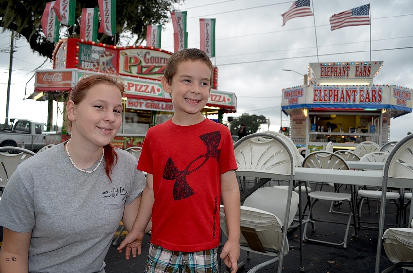 Kristi Harrell and Wyatt Seagraves, of Bradenton, search for a snack.