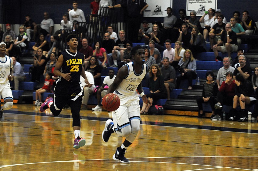 ODA junior Kolbie Ward dribbles toward the basket in the first quarter.