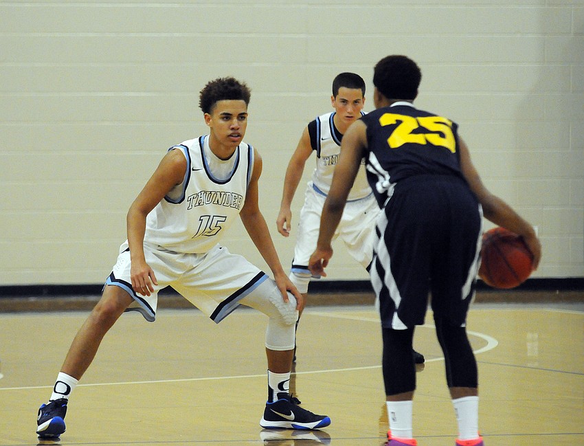 ODA junior Jacob Garrett guards Sarasota Military Academy's London Luther.