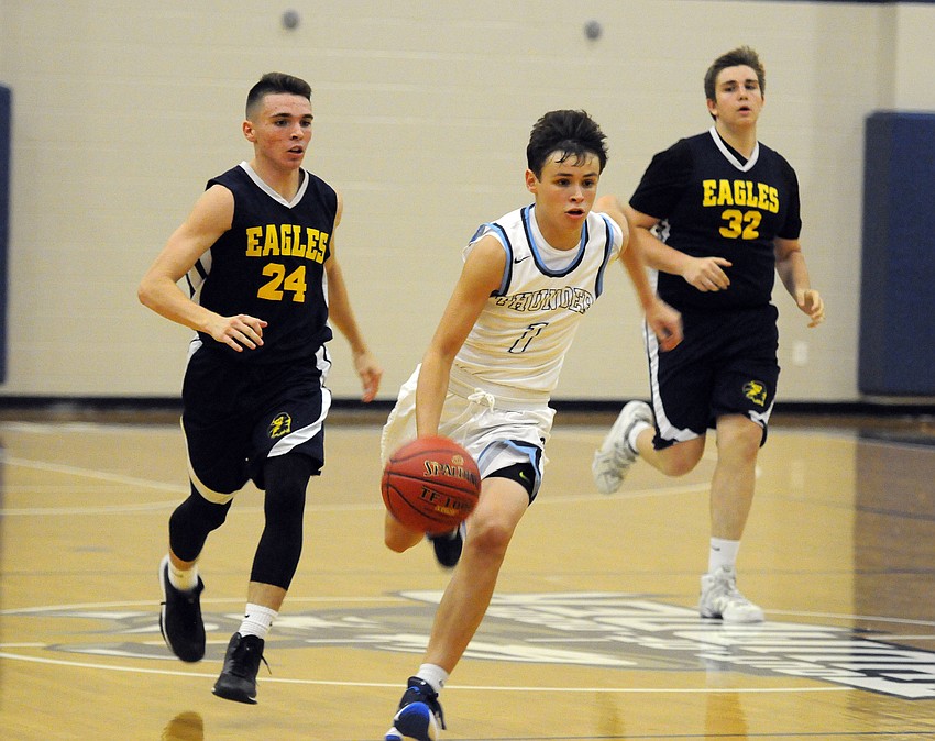 ODA sophomore Chase Maasdorp drives to the basket in the first half.