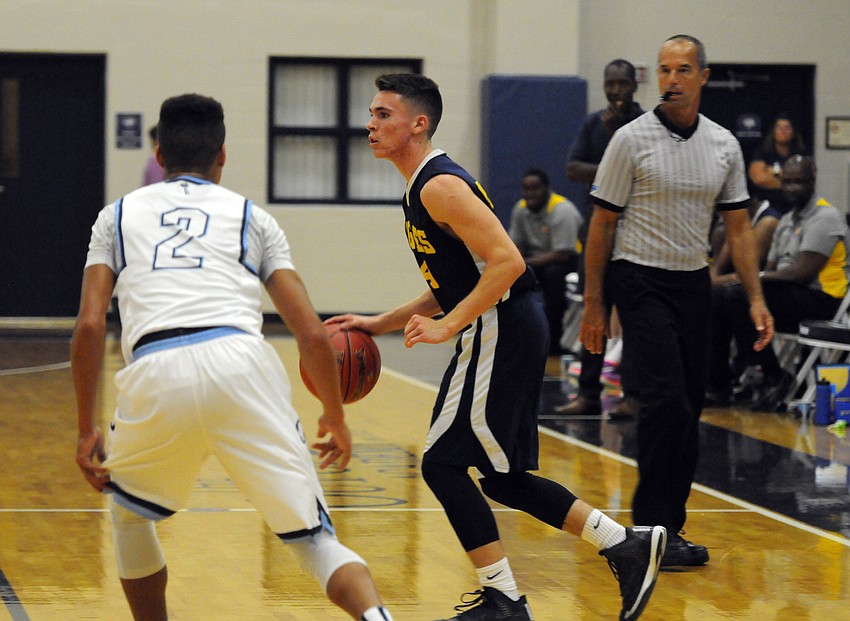 Sarasota Military Academy junior Shelby Rhodes dribbles the ball around ODA's Kendall Johnson.