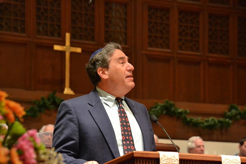 Rabbi Jonathan Katz gives the final blessing for the Interfaith Service at First Presbyterian Church.