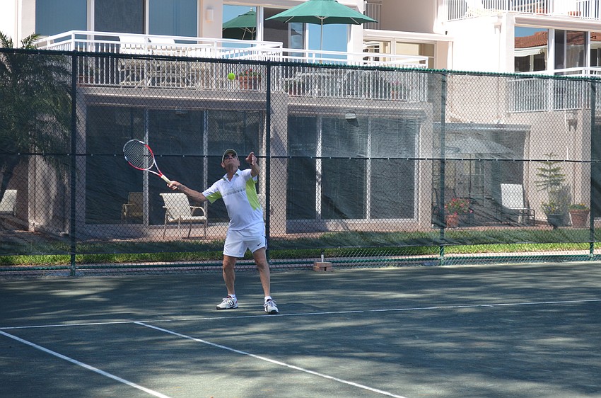 Dan Herz serves.