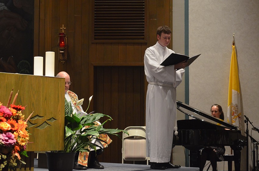 Vicar Kyle Bates, of St. Armands Lutheran Church, recites Psalm 67