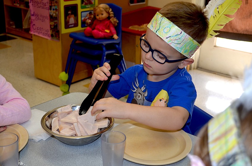 Aiden Yingling, 4, stocks up on turkey.