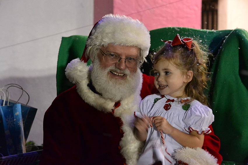 Stella Tompkins asks Santa Claus for a Snow White doll and PAW Patrol toys.