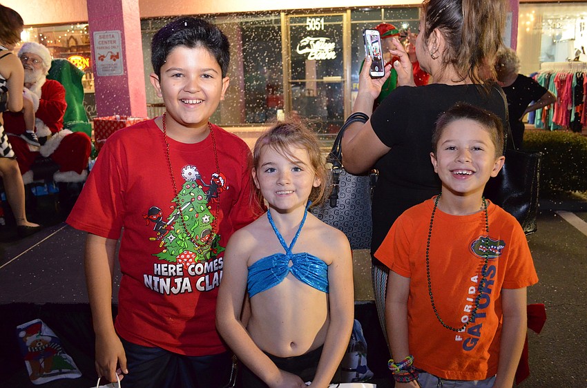 Nicolas Palacio, mermaid Kaylee Morgan and Daniel Palacio.