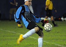 Sophomore goalkeeper Grady Martin sends the ball down the field in the first half.