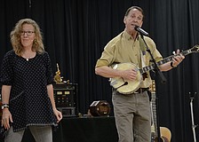 Susana and Timmy Abell perform for the kindergarten, first-grade and second-grade classes.