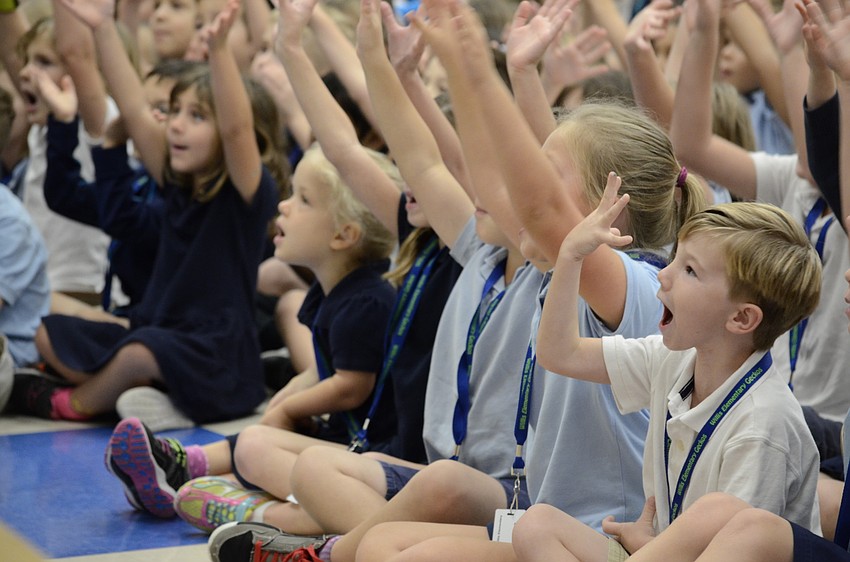 Logan Danahy goes through the song movements with his classmates.