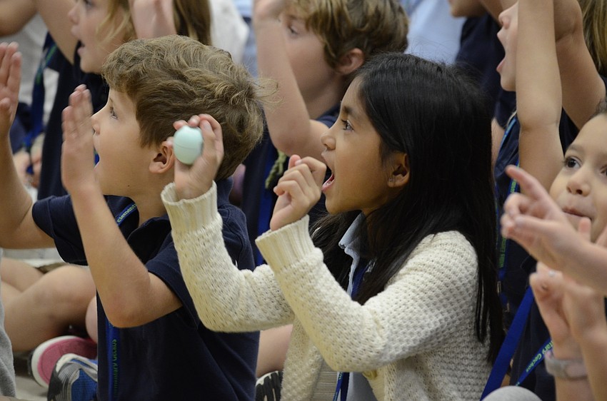 Sonya Pandya performs the movements to the song.