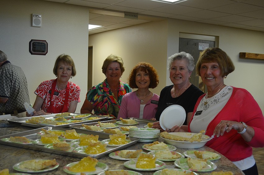 Karolyn Capps, Janet Tuscher, Marlene Slansky, Jean Horensky and Elaine Kiel serve pineapple and coconut cream pie.