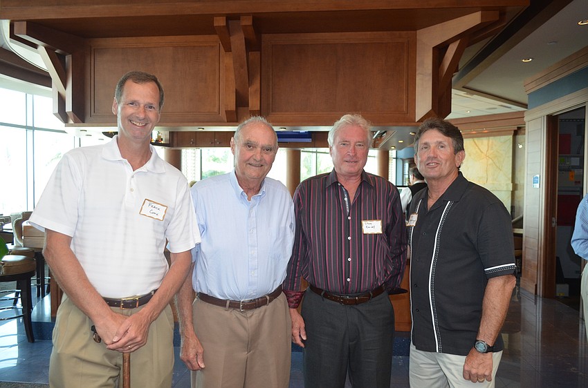 Treasurer Frank Cook, President Stew Cloud, Vice President Steve Koziak and board member Mike McAdaragh