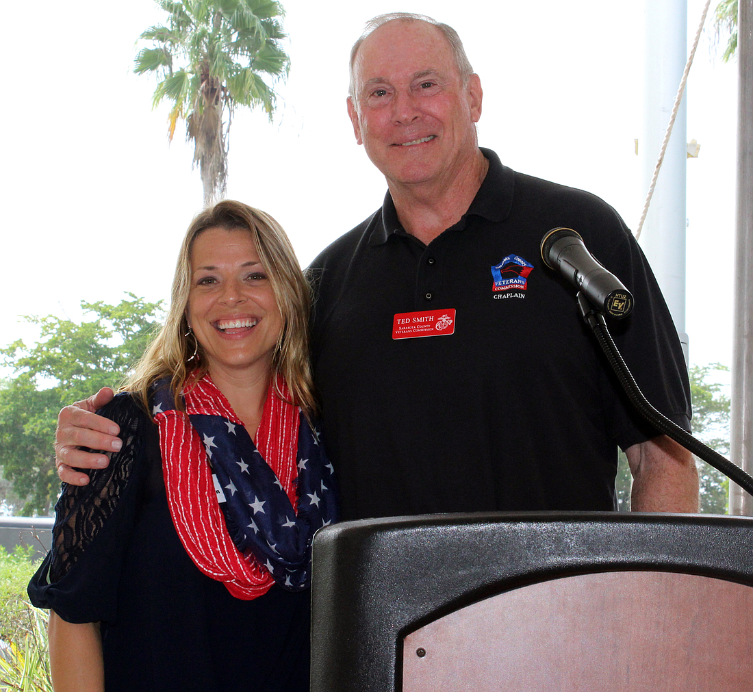 C.J. Bannister received the Woman Veteran of the Year Award from Sarasota County Veterans Commission President Ted Smith.