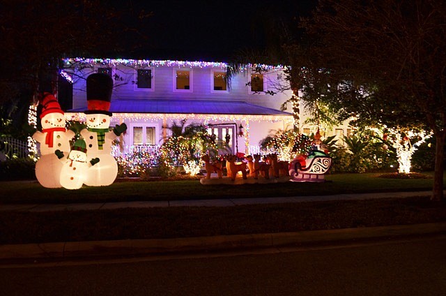 1879 Morris Avenue- Frosty the snowman comes to life with his family at this lights display.