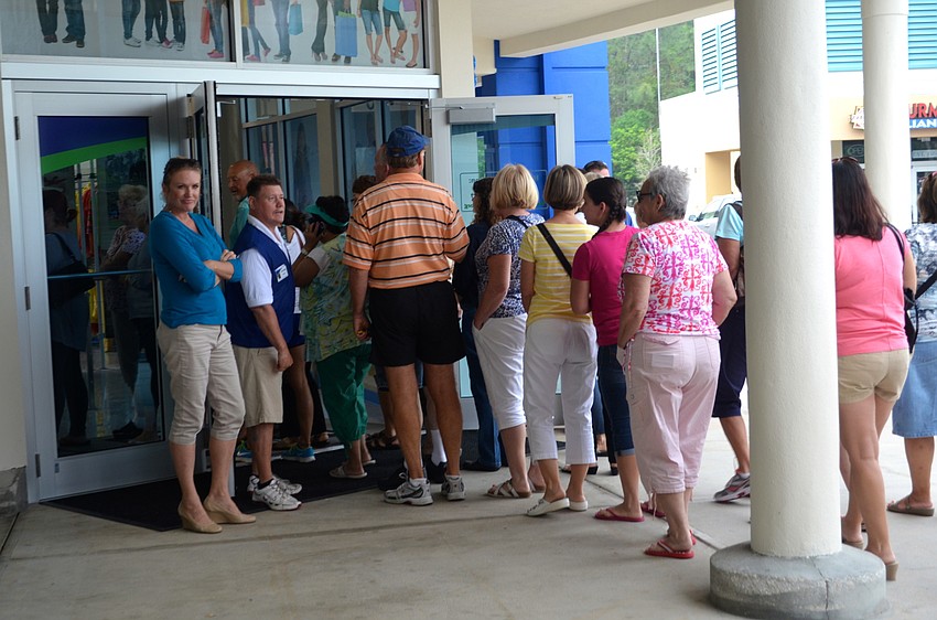 Customers lined the sidewalk in front of Goodwill as wary as 6 a.m.