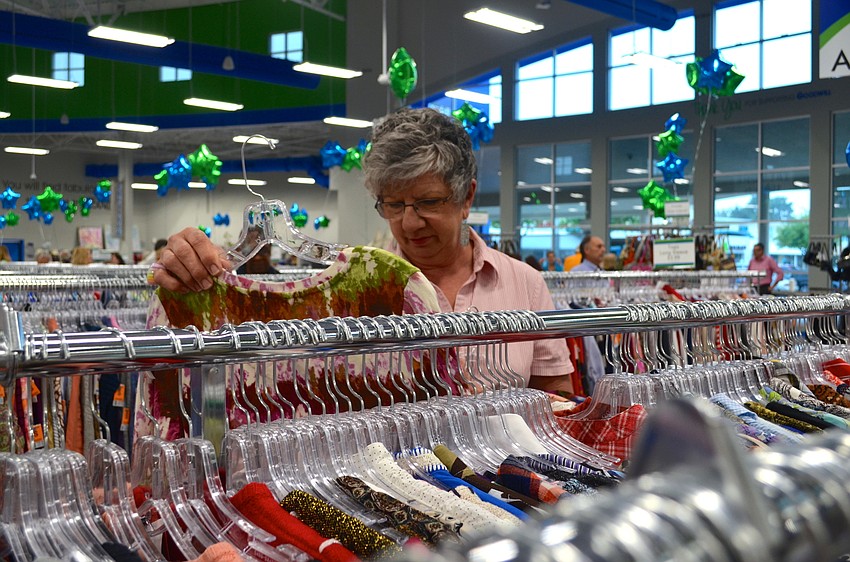 Lynette Hahs browses the women's clothing.