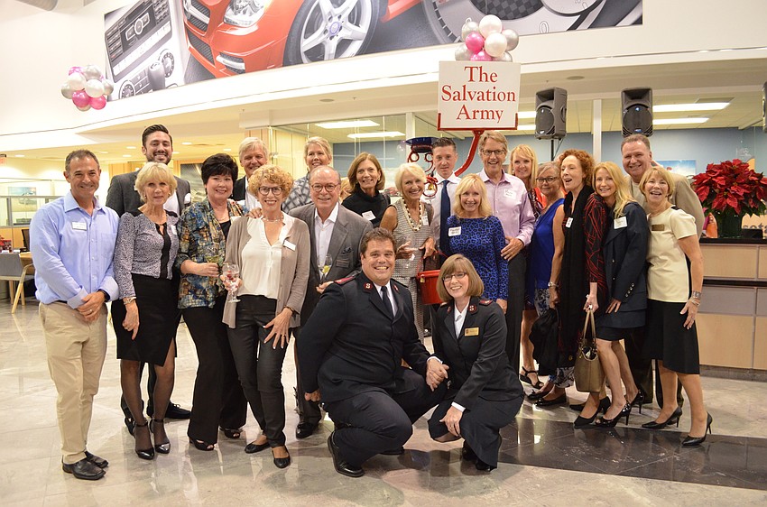 The Premier Sotheby's International Realty team with Ethan and Sue Frizzell.