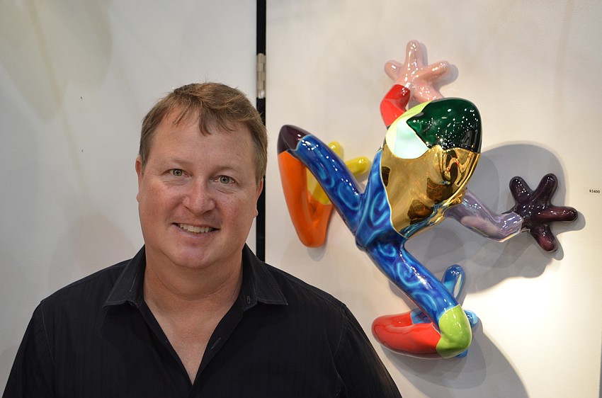 Scott Causey and his ceramic animal sculptures.