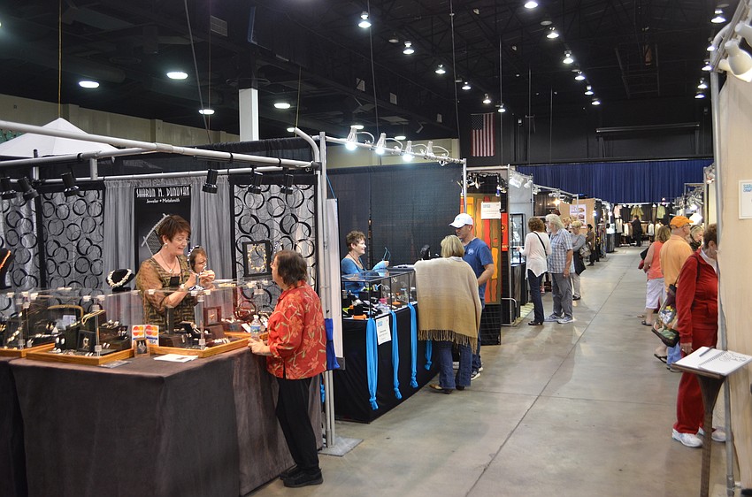 The Robarts Arena is full of over 100 artists' stands selling their handcrafted artwork and wares.