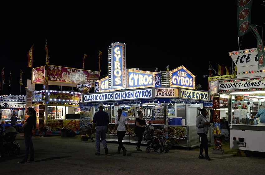 Vendors promising all the fair-favorite cuisine light up the fair.