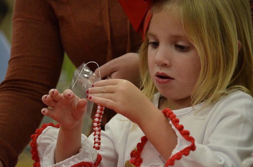 Blaire Marr makes a candy cane.
