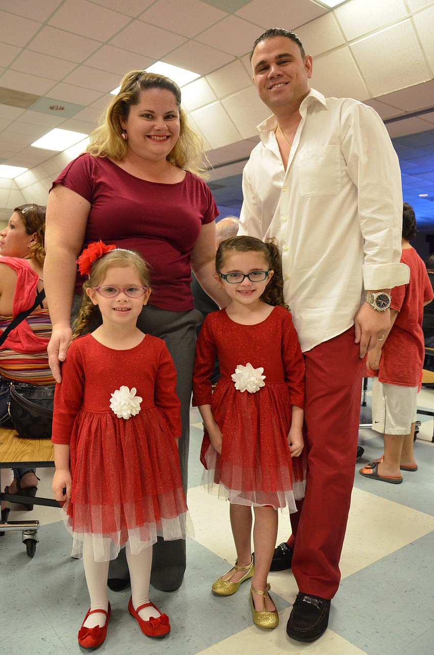 Heather and Neil Pizzo with their daughters, Luciana and Valentina