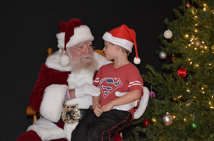 Shaun Teta tells Santa what he wants for Christmas.
