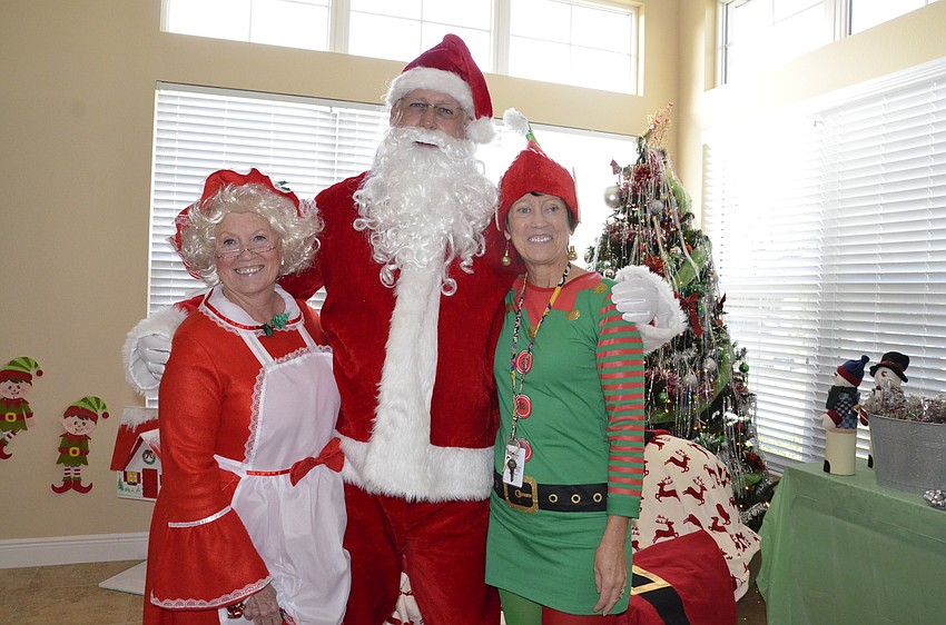 Deej Rausch with Mrs. Claus and Santa