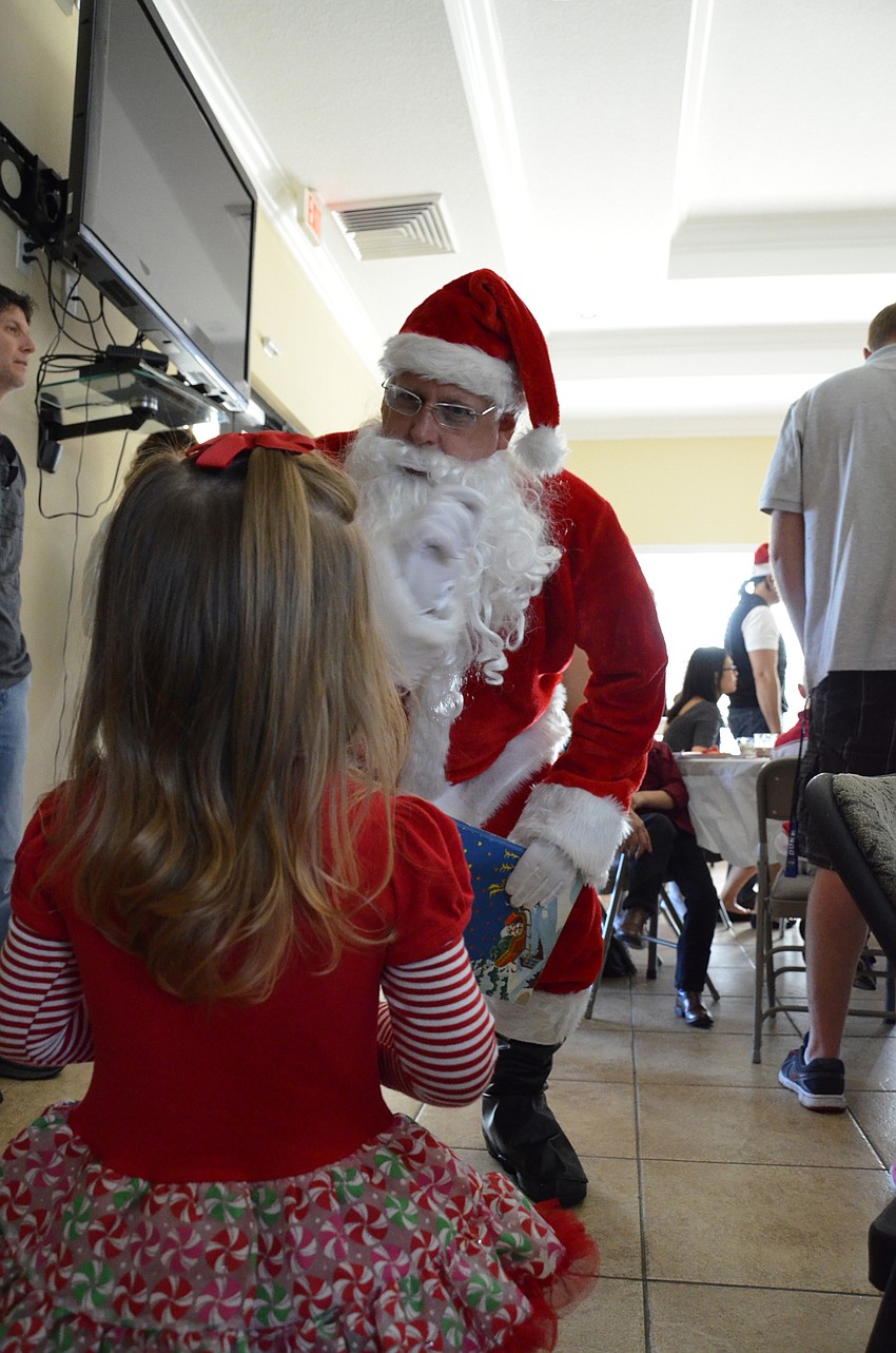 Lauren Bittar talks with Santa.