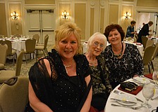 Maribeth Phillips, Chris Gowgiel and Marie Gowgiel, all of Lakewood Ranch, were getting ready to enjoy the Holiday Dinner Dance.