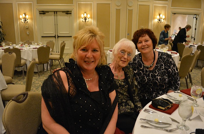 Maribeth Phillips, Chris Gowgiel and Marie Gowgiel, all of Lakewood Ranch, were getting ready to enjoy the Holiday Dinner Dance.