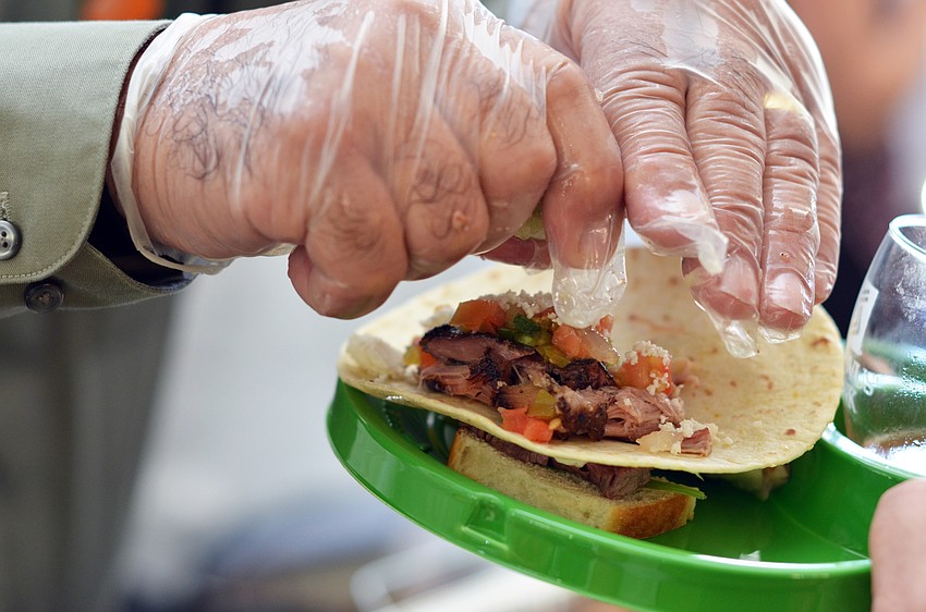 Guests enjoyed food samplings to pair with wine at the Florida Winefest and Auction Bayfront Showcase Lunch Tasting.