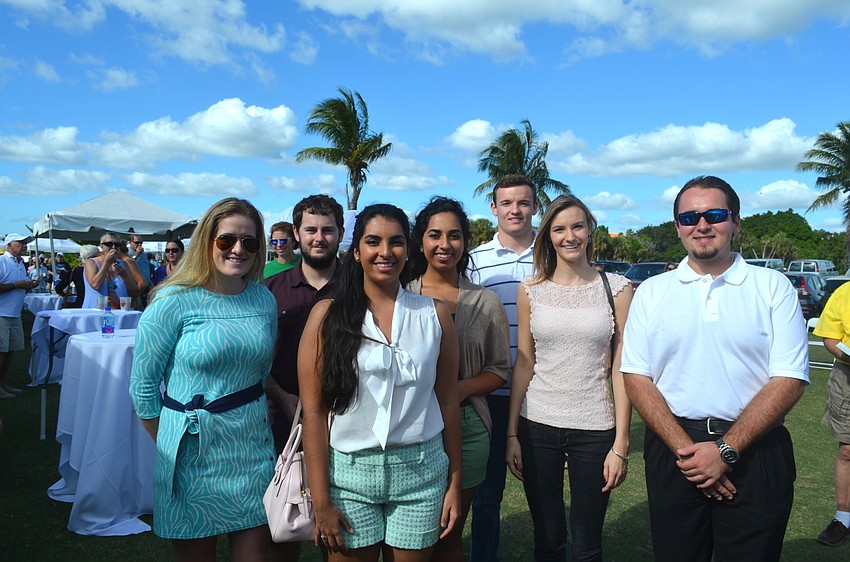 Kiwanis Club scholarship recipients Savannah Schield, Michael Needham, Olivia and Ava Doraisamy, Dustin and Mandy Peebles and Nick Karpathy