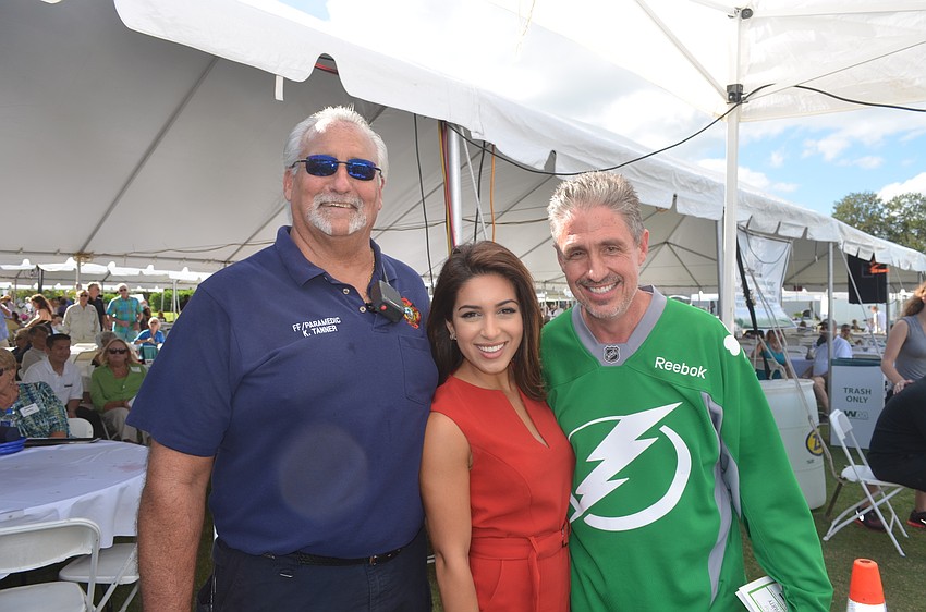 Fifth prize raffle winner Keith Tanner, ABC 7 anchor Rebecca Vargas and event chairman Michael Garey