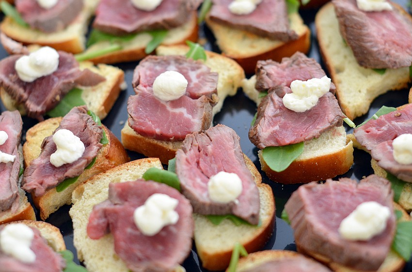 Guests enjoyed food samplings to pair with wine at the Florida Winefest and Auction Bayfront Showcase Lunch Tasting.