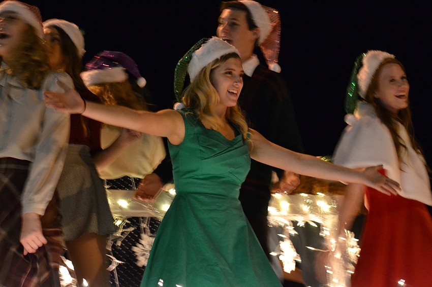 Sarasota High School Theatre performed during the parade to preview the upcoming musical production of 