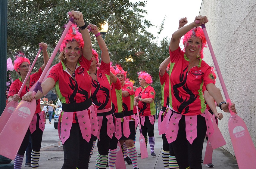 Bambi Famous,Cookie Baldwin and Angela Long lead rowers from Survivors In Sync before the start of the parade.