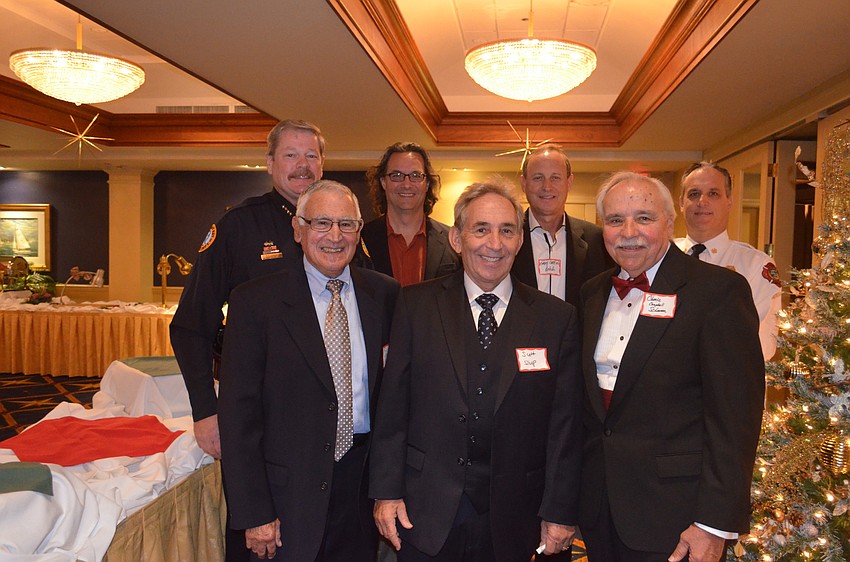 In front: Board members Ron Krum, Scott Schlinder and Charlie Campbell; in back: Police Chief Pete Cumming, Mote Marine Laboratory scientist Vince Lovko, board member Gary Coffin and Fire Chief Paul Dezzi