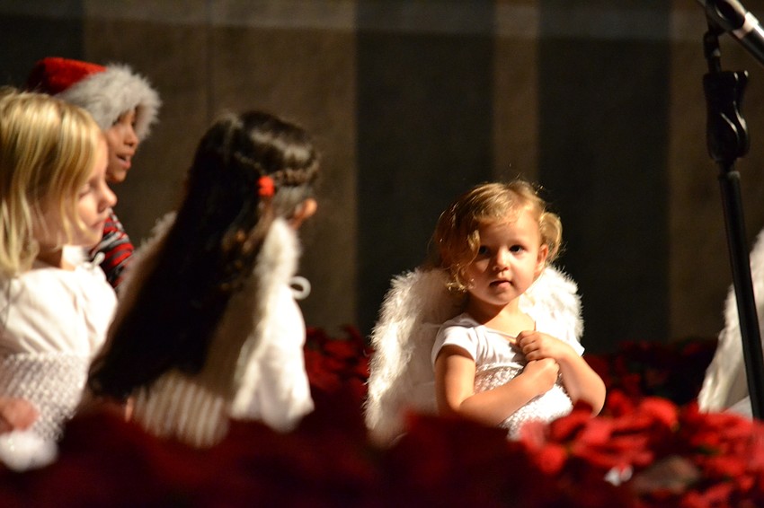 Children dressed as angels, the three wise men, Joseph and Mary during the performance.