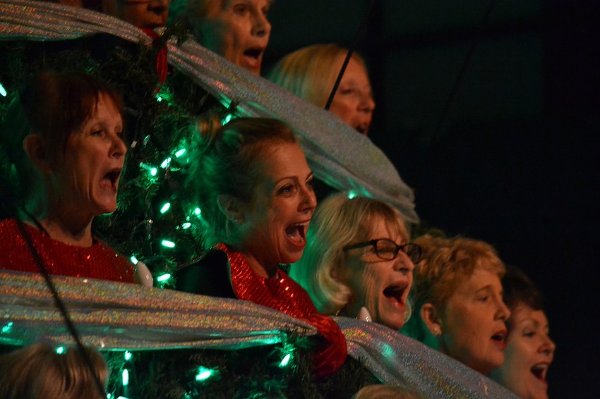 Members of the Singing Christmas Tree Choir performed from the branches of the tree.
