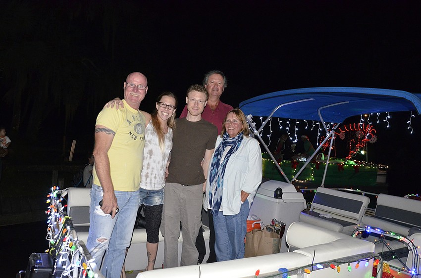 Sarasota resident Don Traver decorated his boat with friends Tara and Travis Gant of Lakewood Ranch and Bob and Diana Warseck of Palm-Aire